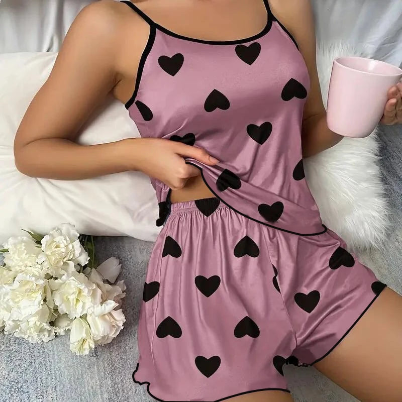 Pink Heart Pajama Set – Soft ice silk pajamas with a comfy round-neck tee and matching shorts, perfect for cozy summer nights.