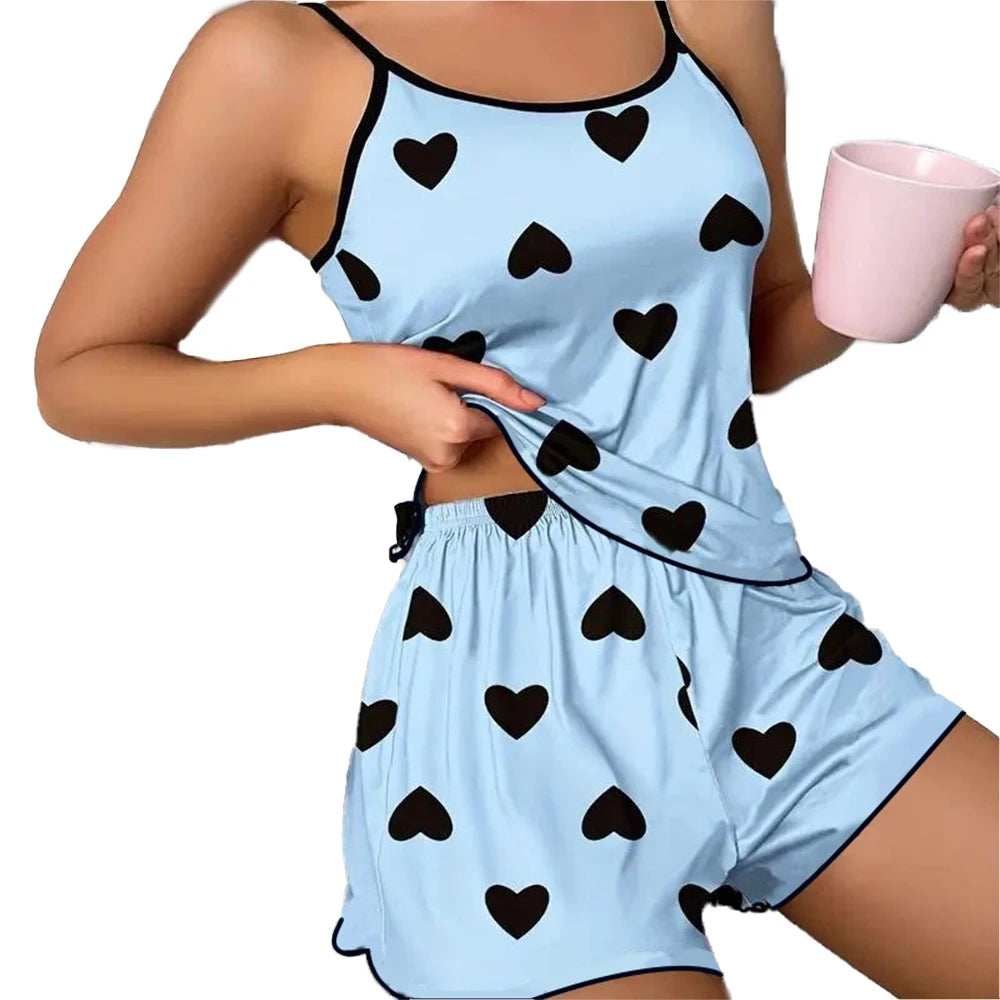 Pink Heart Pajama Set – Soft ice silk pajamas with a comfy round-neck tee and matching shorts, perfect for cozy summer nights.