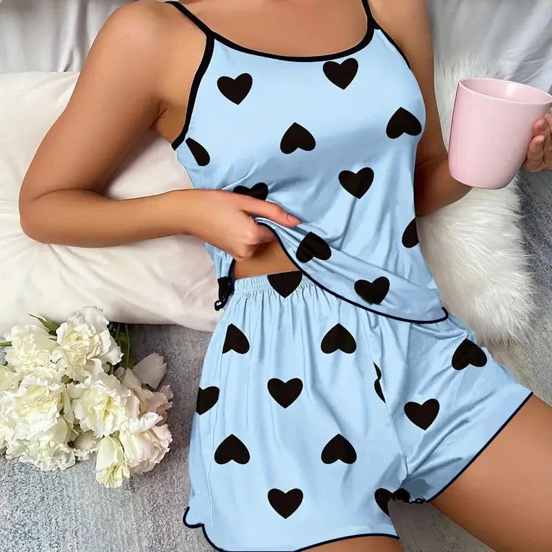 Pink Heart Pajama Set – Soft ice silk pajamas with a comfy round-neck tee and matching shorts, perfect for cozy summer nights.